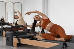 people-taking-pilates-reformer-class (1)webp